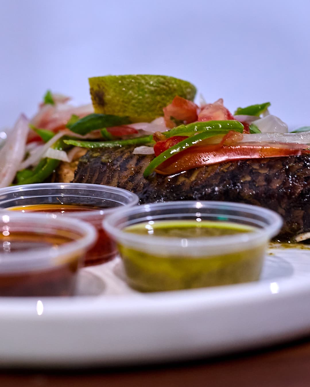 Grilled tilapia with banku